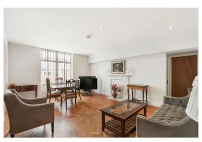 a living room with a couch and a table at 2 Bedroom Apartment Queensway in Moffat