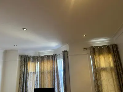 a room with a window with curtains at Flat in Moffat