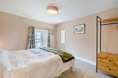 a bedroom with a bed and a window at 2 Bed in Ormathwaite oc-s32385 in Applethwaite
