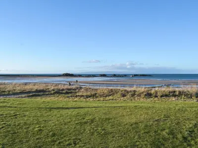 a view of a beach with the ocean in the background at Bay View in Maidens