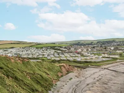 a town on the coast of ireland with houses at Sandpiper in St Bees