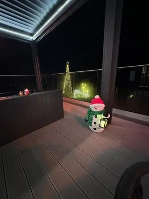 a toy on the balcony of a house with the eiffel tower at Hamish's Hideaway in Eaglesfield