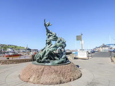 a statue in the middle of a pier at Keekle Terrace in Cleator Moor