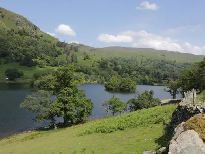 a view of a lake in the hills at Shelley in Ambleside