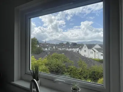 a window with a view of a city at Skiddaw Heights in Keswick