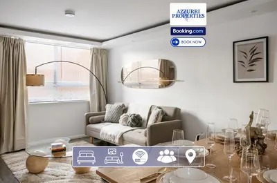 a living room with a couch and a glass table at Cozy 4-Bedrooms House By Azzurri Properties Short Lets & Serviced Accommodation London With Private Garden, Wi-Fi in Moffat