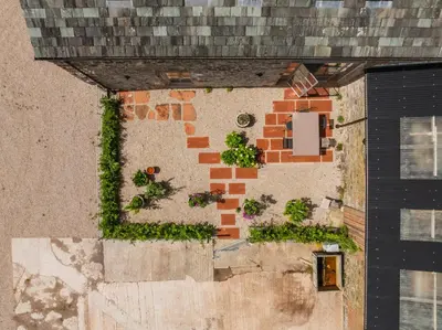 an overhead view of a building with plants on it at Swallow Barn at Greenclose Farm in Penrith