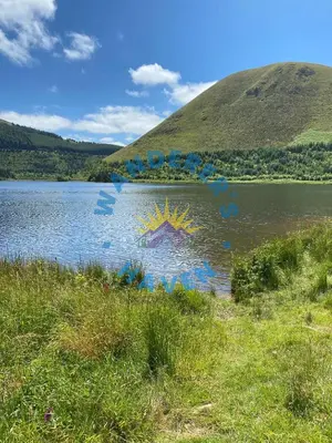 a painting on the side of a lake at Wanderers Haven, Brigham, Cockermouth, Cumbria in Brigham