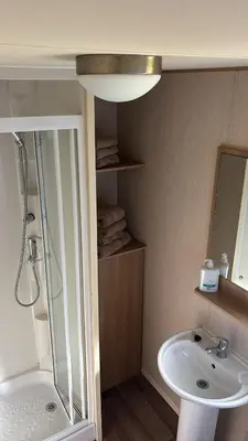 a bathroom with a shower and a sink at Plot 3 ABI Horizon in Moffat