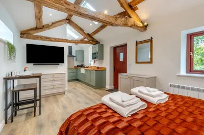 a bedroom with a large bed with two towels at 1 Bed in Wetheral oc-r32933 in Wreay