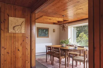 a dining room with a table and chairs at The Hideaway at Yew Trees, Ullswater in Watermillock