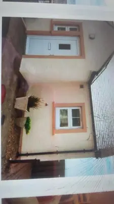 a view of a house with a window at Ocean View in Port William