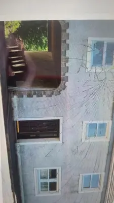 a view of a building with a window at Riverside Cottage in Minnigaff