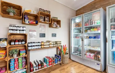 a refrigerator filled with lots of food at Landal Ullswater Heights in Great Blencow