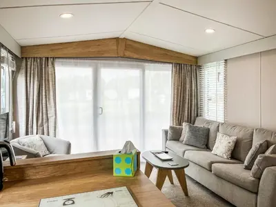 a living room with a couch and a table at Melfell View - Uk50086 in Penruddock