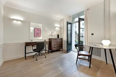 an office with a desk and a table and chairs at Arcore London Premium Apartment Liverpool Street in Moffat