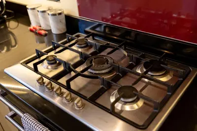 a stove top oven with four burners on it at FREE parking, LARGE House for Contractors & Families, Sleeps 5, 4 miles to BLACKPOOL in Moffat