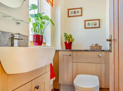 a bathroom with a sink and a toilet at Blengfell by Prestige Properties SA in Gosforth