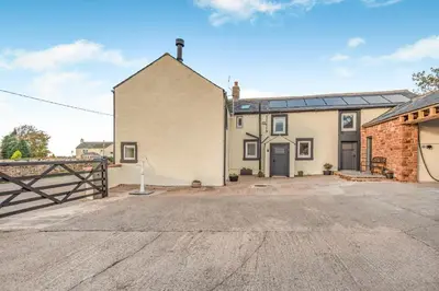 an image of a house with a driveway at 3 Bed in Wigton oc-f33746 in Westward
