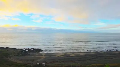 a view of the ocean on a cloudy day at 17 Ruby Atlas Monreith in Monreith