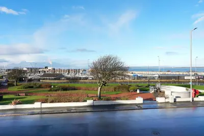 a view of a park with a tree and a street at Mariners Haven in Troon in Troon