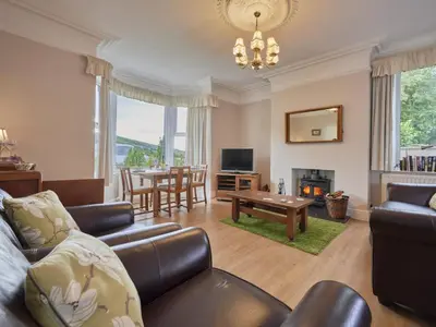 a living room with a couch and a table at 2 Bed in Cockermouth oc-sz431 in Bassenthwaite Lake