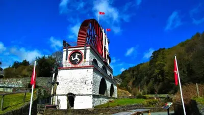 a building with a clock tower on top of it at Bed And Blueberry Two Bed Suite for 2,3, or 4 people in Douglas