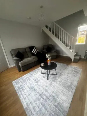 a living room with a couch and a table at Oakleigh Way, Carlisle - 2 Bedroom, sleeps 4, Fully furnished in Carlisle