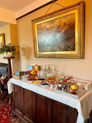a table with a buffet of food on it at Scale Hill Hotel in Loweswater