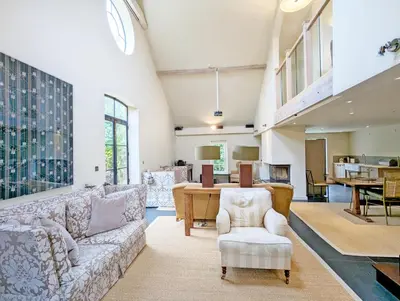 a living room with a couch and a table at The Granary in Moffat