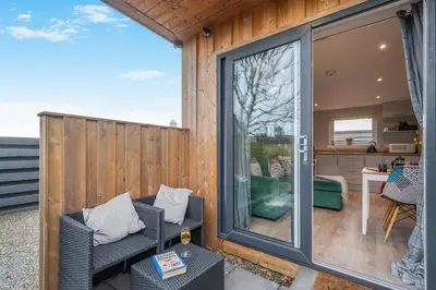 a screened in porch with a sliding glass door at 1 Bed in Gatehouse Of Fleet oc-t34445 in Gatehouse of Fleet