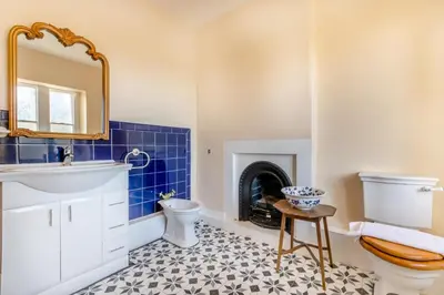 a bathroom with a sink and a toilet at 4 Bed in Great Clifton oc-r34663 in Great Clifton
