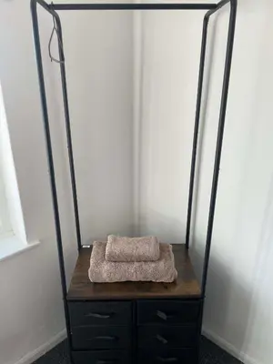 a dresser with a mirror on top of it at Brisco Terrace-sleeps 6 in Woodend