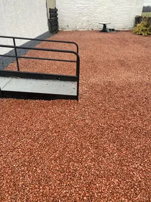 a bed sitting on top of a pile of gravel at Gramhor House in Dumfries
