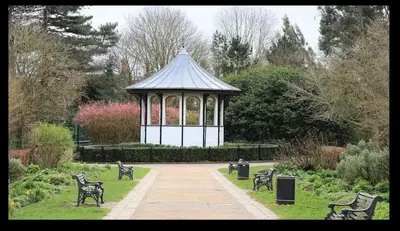 a gazebo in the middle of a park with benches at Contractor ready two bedroom flat in Moffat