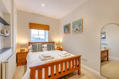 a bedroom with a bed and a window at 5 Bed in Keswick oc-h33619 in Keswick