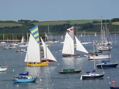a group of sailboats in a large body of water at THE WHEEL,Harbour view apartment for two - private front entrance and patio in Moffat