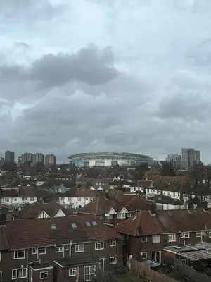 a view of a city with houses and a stadium at Modern City Apartment, Fast Wi-Fi, Great View in Moffat