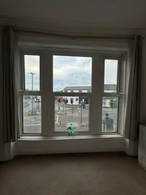 a large window with a view of a street at 9-11 London Road, Carlisle, CA12JU in Carlisle