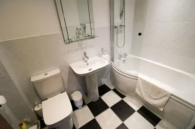 a bathroom with a sink and a toilet and a bath tub at Vallum, Irthington on Hadrians Wall in Irthington