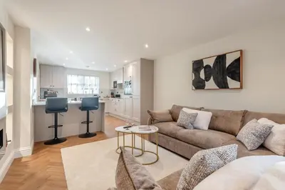 a living room with a couch and a table at 2 Bed in Gretna Green oc-n34146 in Gretna Green