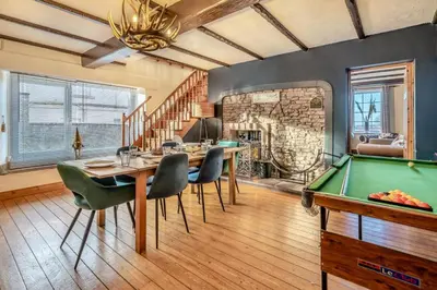 a dining room with a table and a pool table at 6 Bed in Low Moresby oc-l34667 in Distington