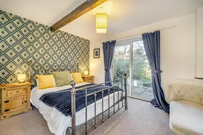 a bedroom with a bed and a window at 6 Bed in Low Moresby oc-l34667 in Distington
