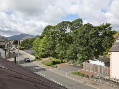 a view of a street with a tree and a road at 22 Rose Terrace in Keswick