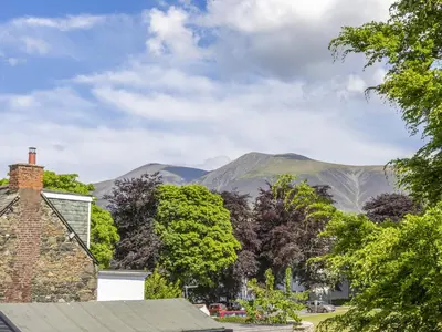 a view of mountains from a house at Jame's Cottage in Keswick