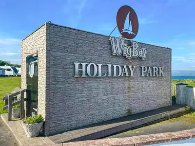 a sign for a wilyboy holiday park at The View in Stranraer