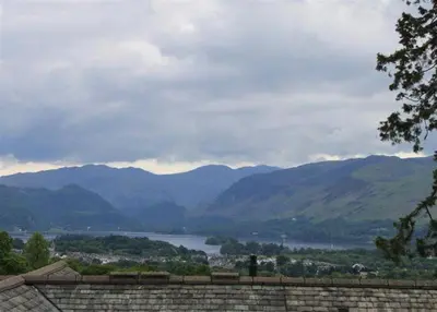a view of a lake with mountains in the background at Catbells in Applethwaite