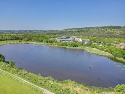 an aerial view of a river with ducks in it at 1 Bed in Isel oc-b32075 in Sunderland