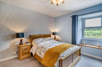 a bedroom with a bed and a window at 2 Bed in Rowrah oc-s32232 in Rowrah