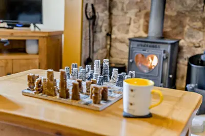 a tray of food on a table with a cup of coffee at 2 Bed in Rowrah oc-s32232 in Rowrah